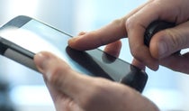 Close up of person using a mobile phone screen